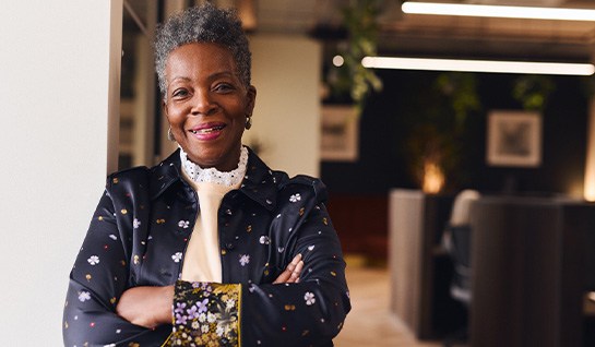 Senior woman smiling in office